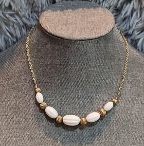 Elegant Gold and White Beaded Necklace